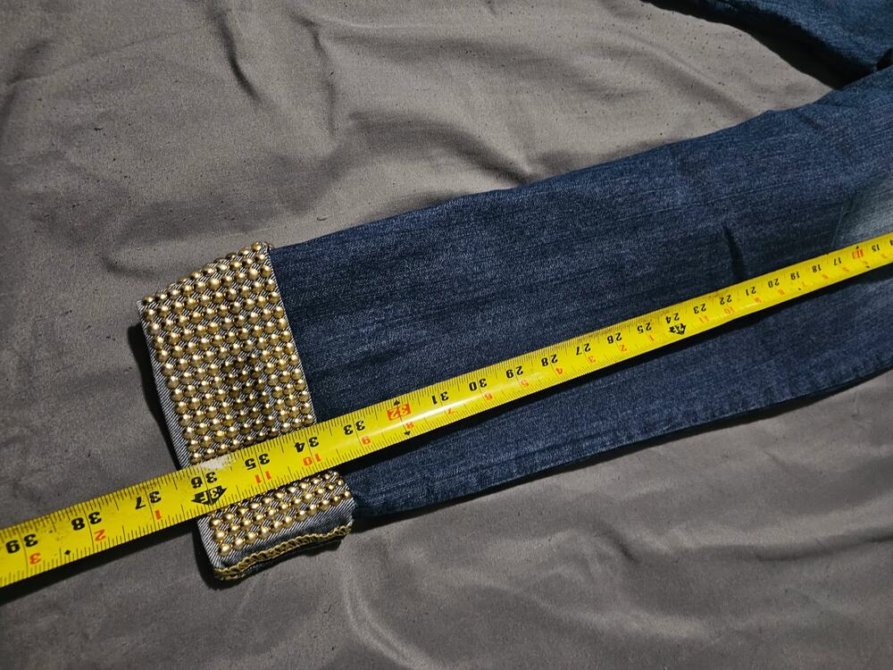 Studded denim belt with brass-tone buckle